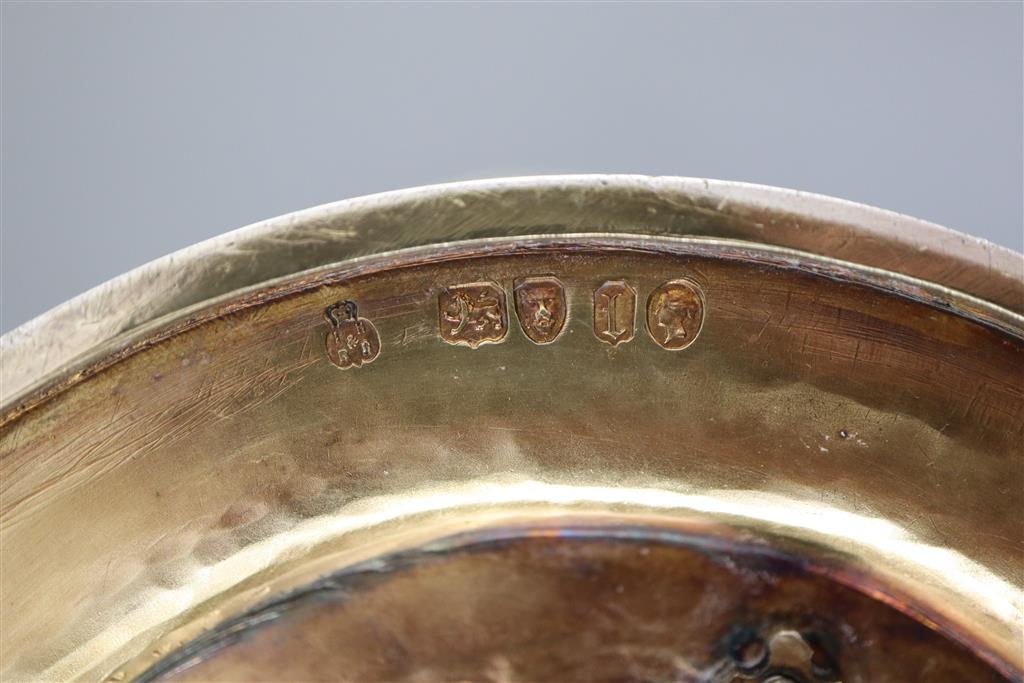 A handsome pair of Victorian parcel gilt silver oval comports by Hunt & Roskell (lacking glass bowls),